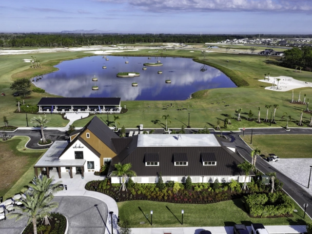 aerial of the club house and Toptracer Aquatic Driving Range