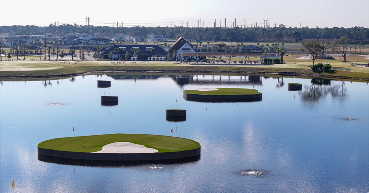 Aerial view of floating golf greens surrounded by water.